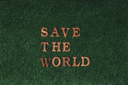 Eco awareness campaign for Earth day concept showcase message arranged in Save Earth on biophilic green background. Environmental social governance concept idea for sustainable and greener future.Gyreの写真素材