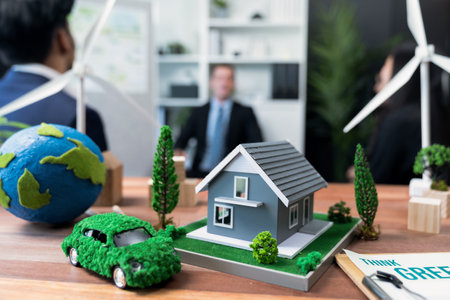 Mockup electric car with eco-friendly energy infrastructure on table with blurred background of productive business team meeting to contribute natural preservation and sustainable future. Quaintの写真素材