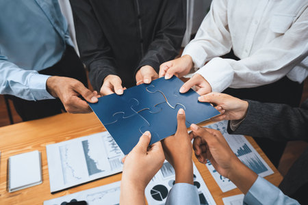 Corporate officer worker collaborate in office, connecting puzzle pieces with report paper on table...