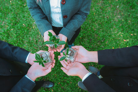 Concept of sustainable money growth investment with glass jar filled with money savings coins with...