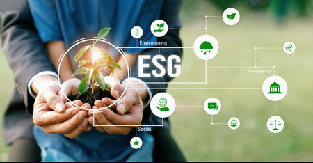 Businessman and little kid holding seedling plant together with ESG and eco icon. Green business investing on environment sustainability and natural protection for greener future. Panorama Relianceの写真素材