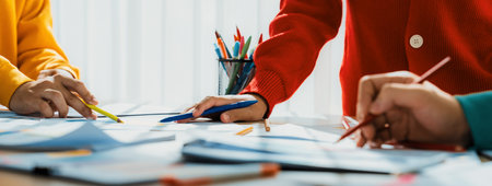 Startup company employee working together, analyzing BI dashboard paper on financial data report and...
