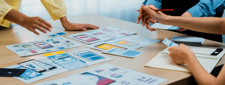 Panorama banner of startup company employee planning on user interface prototype for mobile...