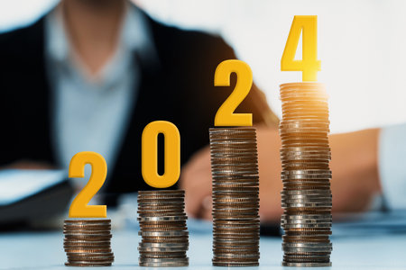 Growth coin stack symbolizing business investment and economic growth. Business people doing...