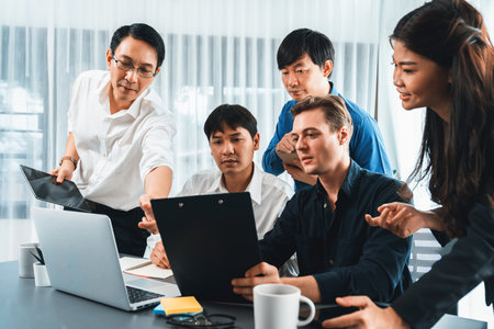 Group of diverse office worker employee working together on strategic business marketing planning in corporate office room. Positive teamwork in business workplace concept. Prudentの写真素材
