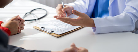 Couple attend fertility consultation with gynecologist at hospital as part family planning care for pregnancy. Loving husband and wife support each other through the doctor appointment. Panorama Rigidの写真素材