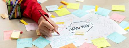Professional startup group share creative marketing idea by using mind map. Young skilled business...