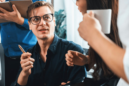 Group of diverse office worker employee working together on strategic business marketing planning in corporate office room. Positive teamwork in business workplace concept. Prudentの写真素材