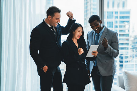 Professional happy diverse business team celebrate their successful project. Group of happy successful businesspeople applause, enjoy with increasing sales. Successful business team work. Ornamented.の写真素材