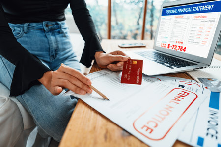 Stressed young woman has financial problems with credit card debt to pay uttermost show concept of bad personal money and mortgage pay management crisis.の写真素材