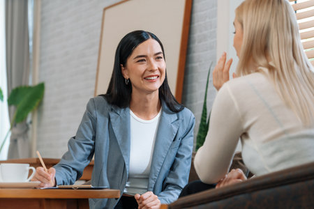 Psychological consultation on mental health or seeking help from professional, young patient on therapy session while psychiatrist making diagnostic on mental illness. Mental treatment session. Blitheの写真素材