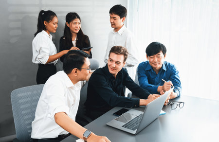 Group of diverse office worker employee working together on strategic business marketing planning in corporate office room. Positive teamwork in business workplace concept. Prudentの写真素材