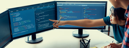 Young Professional website developer and cooperative computer engineer team brainstorming and...