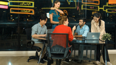 Skilled business team discussion about start up project at office. Group of businesspeople talking,...