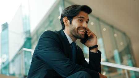 Smart business man calling phone to manager while discuss about business plan. Skilled executive...