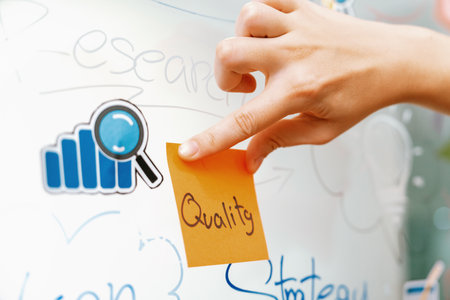 Closeup of professional businesswoman hand put and stick the colorful sticky notes on whiteboard while presenting business plan. Creative business meeting and brainstorming concept. Immaculate.の写真素材