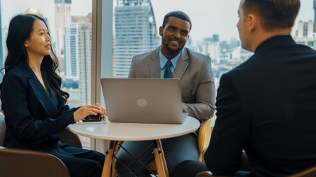 Ornamented office overlooking city skyline, diversity corporate professional discuss ambitious business expansion or strategic marketing. Financial advisor give consulting business insights and ideaの写真素材