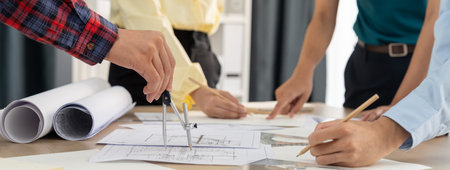Skilled architect engineer team discuss about architectural project while project manager using...