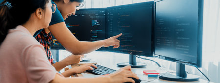 Group of professional web developer discuss about data analysis while computer screen show computer...