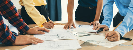 Skilled architect engineer team discuss about architectural project while project manager using...