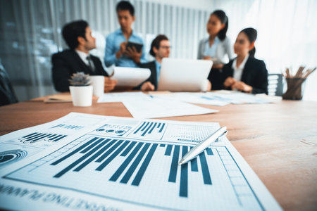 Piles of analyzed financial data dashboard on meeting table with background of business people analyzing data analysis market trend indication for strategic marketing investment plan. Habilimentの写真素材