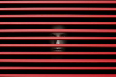 Scary eye peek out of strip lines abstract concept of unhappy vision minimal comelinessの素材