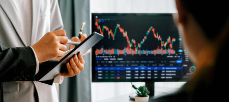 Professional businesspeople discussion about financial investment. Female broker presents growth...