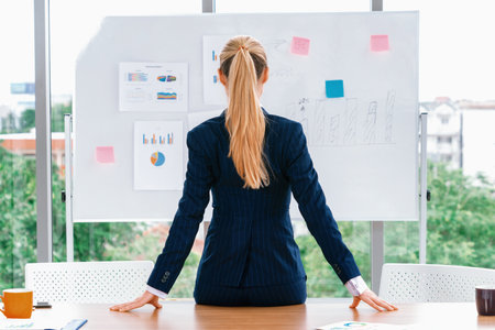 Businesswoman leader planning project on the board in office. udsの写真素材