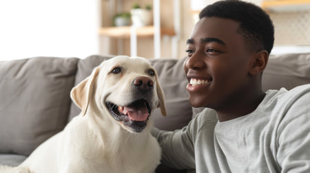 happy people at home with favorite pet , love and friendship of human and animal pragmaの素材