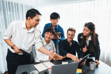Group of diverse office worker employee working together on strategic business marketing planning in corporate office room. Positive teamwork in business workplace concept. Prudentの写真素材