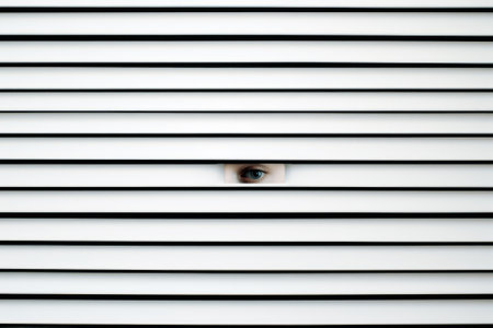 Scary eye peek out of strip lines abstract concept of unhappy vision minimal comelinessの素材
