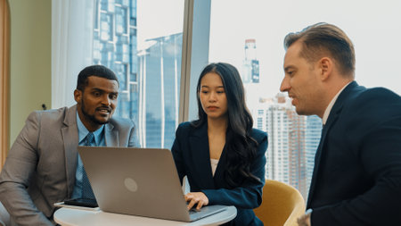 Ornamented office overlooking city skyline, diversity corporate professional discuss ambitious business expansion or strategic marketing. Financial advisor give consulting business insights and ideaの写真素材