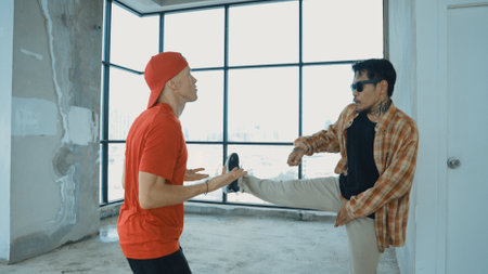 Group of multicultural hipster practice break dance with cityscape or sky scrapper view. Attractive multiethnic people dancing together while moving body to music. Outdoor sport 2024. Endeavor.の写真素材