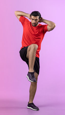 Full body length gaiety shot athletic and sporty young man with fitness warmup and stretching body for pre exercise posture on isolated background. Healthy active and body care lifestyle.の写真素材