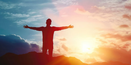 successful man celebrate his victory in sunset pragmaの素材