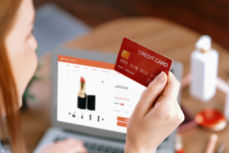 Woman shopping online on internet marketplace browsing for sale items for modern lifestyle and use credit card for online payment from wallet protected by utmost cyber security softwareの写真素材