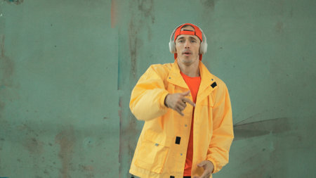 Closeup image of caucasian hipster shows or practicing footstep at street, urban city. Motion shot...