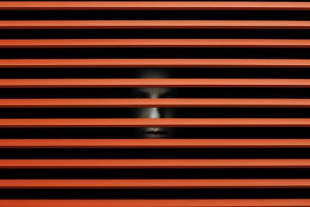 Scary eye peek out of strip lines abstract concept of unhappy vision minimal comelinessの素材