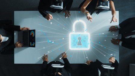 Smart project manager working on laptop and sending security code to diverse business people by...