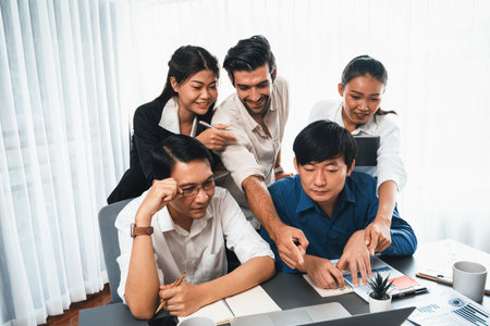 Group of diverse office worker employee working together on strategic business marketing planning in corporate office room. Positive teamwork in business workplace concept. Prudentの写真素材