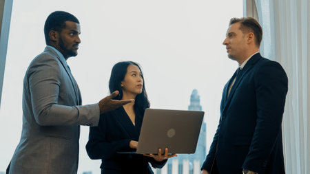 Ornamented office overlooking city skyline, diversity corporate professional discuss ambitious...