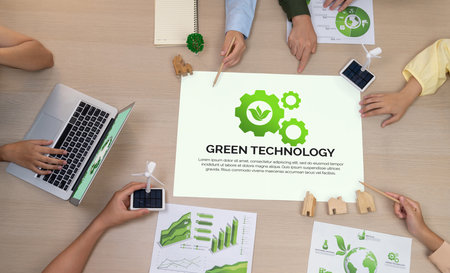 Green technology illustration placed on a meeting table during a green business meeting discussion. ESG environment social governance and Eco conservative concept. Top view. Delineation.の写真素材