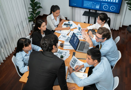 Diverse group of business analyst team analyzing financial data report. Finance data analysis chart...