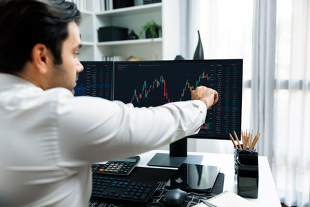 Trader businessman calling to consultant or partner with two stock exchange investment, compare data...