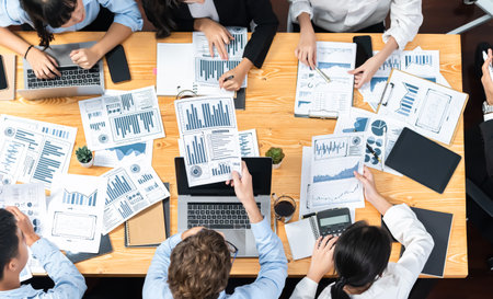 Panorama top view diverse group of business analyst team analyzing financial data report paper on...