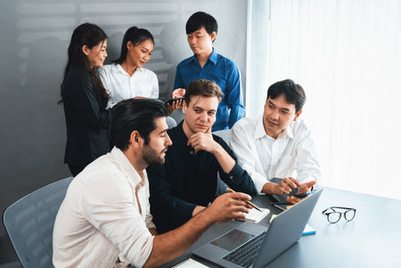 Group of diverse office worker employee working together on strategic business marketing planning in corporate office room. Positive teamwork in business workplace concept. Prudentの写真素材
