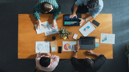 Top view of business team attend meeting while prepare working and analyzing data. Group of diverse...