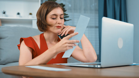 Stressed young woman has financial problems with credit card debt to pay prim from bad personal money and mortgage pay management crisis. Woman worry about financial bankruptcy risk from over spendingの写真素材