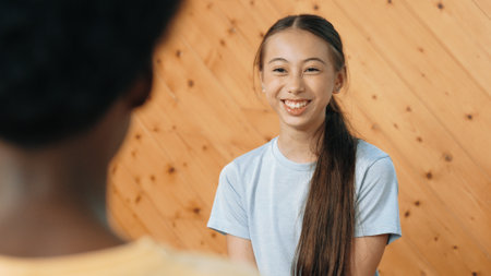 Young smart girl discussion about problem while sitting in circle. Skilled happy highschool student...