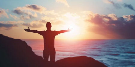 successful man celebrate his victory in sunset pragmaの素材